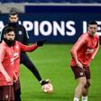 Lionel Messi (C) and his Barcelona teammates trained at Lyon's Groupama Stadium on Monday ahead of Tuesday's last 16, first leg