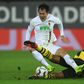 Augsburg's South Korean forward Ji Dong-won scored twice on Friday as Bundesliga leaders Borussia Dortmund crashed to a shock 2-1 defeat in Bavaria.