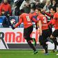 Rennes players celebrate after winning the French Cup final on penalties against PSG