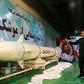 Iranian Revolutionary Guards commander-in-chief Mohammad Ali Jafari (R) views the new "Dezful" missile, during an unveiling ceremony at an undisclosed location on February 7, 2019