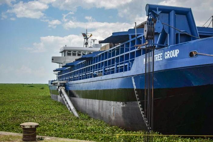 The dredger MV Mango Tree, tasked with removing water weeds on Lake Victoria and turning them into fertiliser, lands at the Kisumu Port docks.