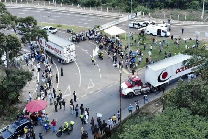 Aerial view of trucks loaded with humanitarian aid for Venezuela driving to the Tienditas Bridge on the border between Cucuta, Colombia and Tachira, Venezuela, on February 7, 2019