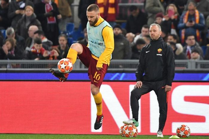 Roma captain Daniele De Rossi warms up prior to the Champions League first-leg match against Porto in Rome