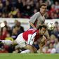 Gilles Grimandi (L), pictured during his playing days as a defender with Arsenal in 2001, will rejoin ex-Gunners teammate Patrick Vieira