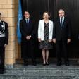 Cypriot President Nicos Anastasiades (L) stands alongside Elizabeth Spehar, head of the UN peacekeeping force on the island, and Turkish Cypriot leader Mustafa Akinci, before their informal meeting in the buffer zone