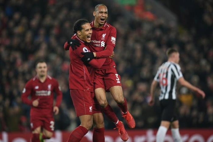 Fabinho (right) is expected to replace the suspended Virgil van Dijk (centre) for Liverpool on Tuesday