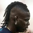 Mario Balotelli left the field with a thigh injury before his team Marseille scored twice to beat Nimes on Saturday