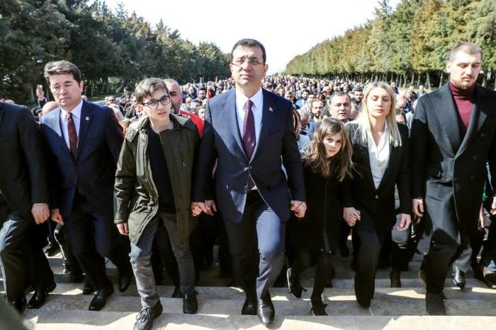 Turkey's opposition candidate Ekrem Imamoglu (C) claimed victory in the Istanbul election, saying the difference between himself and AKP's candidate was around 19,000 votes during a recount.