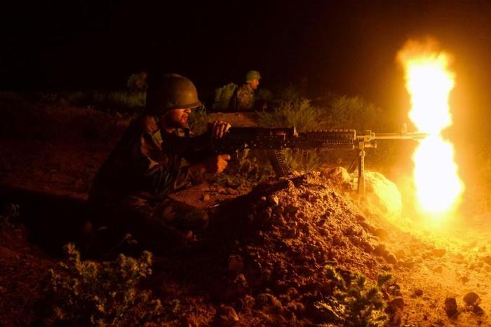 Afghan National Army soldiers take part in a military exercise at a base in Guzara district in Herat province on May 15, 2019
