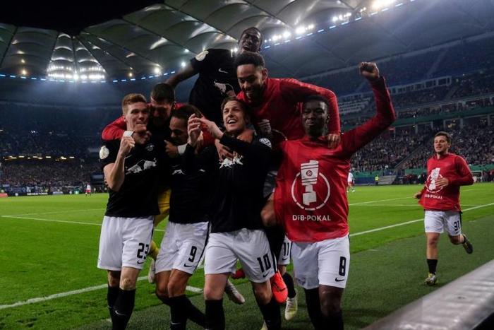RB Leipzig fired three goals past Hamburg on Tuesday to reach the German Cup final for the first time in their history