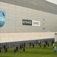 In the money: Manchester City players attend a team training session at the club's academy