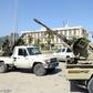Forces loyal to Libya's Government of National Accord (GNA) gesture on April 18, 2019, after taking control of the area of al-Aziziyah, located some 40 kilometres south of the Libyan capital Tripoli, following fierce clashes with forces loyal to strong...