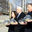 US Vice President Mike Pence (2nd L) passed through the Auschwitz camp's infamous "Arbeit macht frei" ("Work makes you free") gate before laying a wreath at the death wall where the Nazis executed thousands of people