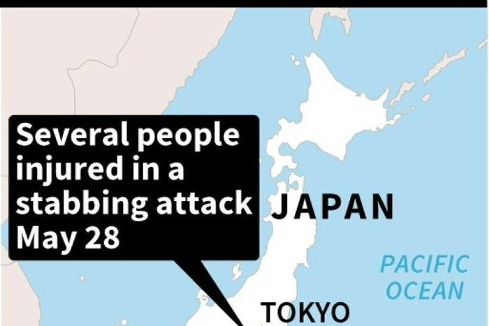 Two people, including a child, were feared dead Tuesday in a mass stabbing attack that also injured 17 people in the Japanese city of Kawasaki
