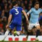 Treble chance - Manchester City's Bernardo Silva (C) in action against Leicester
