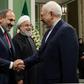 Iranian Foreign Minister Mohammad Javad Zarif welcomes Armenian Prime Minister Nikol Pashinyan to Tehran in front of a smiling President Hassan Rouhani who rejected his top diplomat's resignation