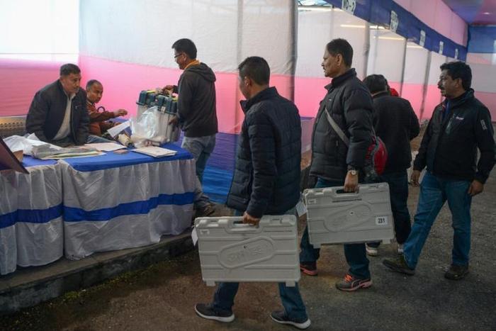 Indian election officials prepare a polling station in Darjeeling ahead of the next round of voting on April 16