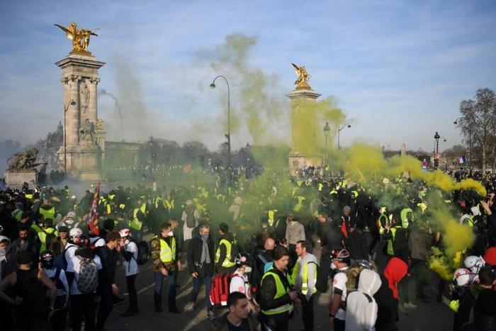 Thousands of people took part in 'yellow vest' protests for a 14th consecutive weekend