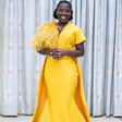 Gospel Singer, Diana Hamilton stuns in a yellow gown.