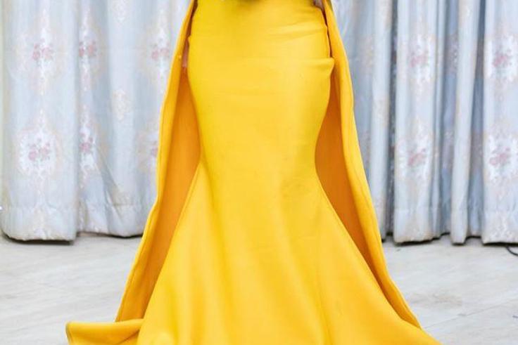 Gospel Singer, Diana Hamilton stuns in a yellow gown.