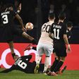 PSG's Presnel Kimpembe conceded a penalty for handball after a VAR review in a 3-1 Champions League defeat to Manchester United on Wednesday