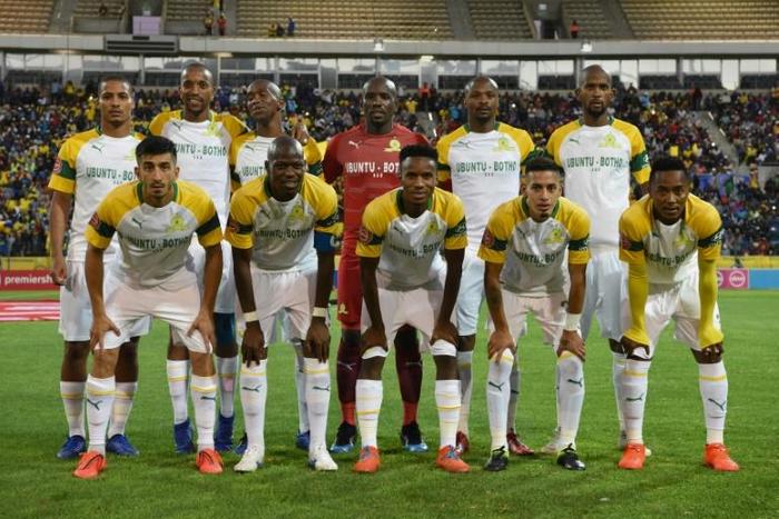 Mamelodi Sundowns defeated Golden Arrows 2-0 Tuesday and are one victory away from a record-extending ninth South African Premiership title