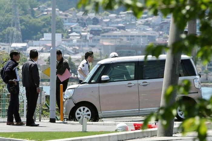 Police said the car veered onto the pavement after making 'contact' with another larger vehicle