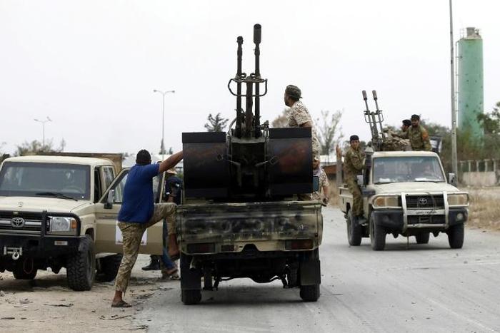 Fighters loyal to Libya's internationally-recognised Government of National Accord wait near the frontline on May 21, 2019 during clashes against forces loyal to strongman Khalifa Haftar, who said the conditions for halting hostilities "were not met"
