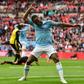 Raheem Sterling and his Manchester City team-mates who have joined up with the England squad help to instil a winning mentality to the other players after their domestic treble says central defender Harry Maguire
