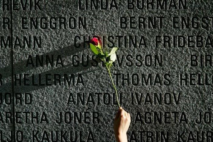 A granite memorial wall in Stockholm bears the names of the victims of the 1994 disaster