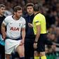 Spanish referee Antonio Mateu Lahoz checks on Tottenham defender Jan Vertonghen (centre) as he prepares to come back onto the pitch after suffering a head injury