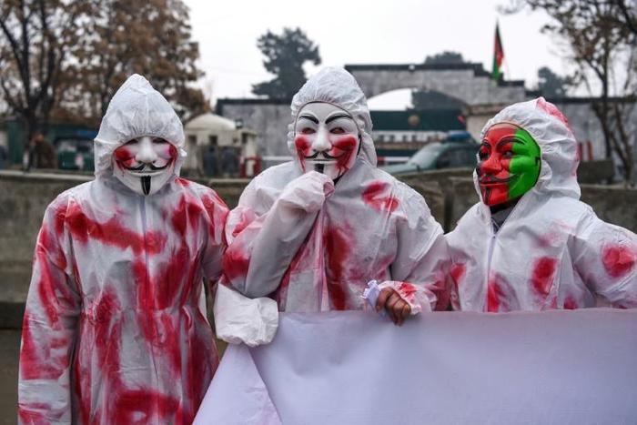 Civil society activists in Kabul hold a protest in March 2019 against the killing of civilians