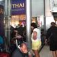 Stranded passengers wait outside the Thai Airways ticket counter at Suvarnabhumi International Airport in Bangkok after the airline cancelled 11 European-bound flights due to Pakistan closing its airspace amid mounting tensions with India