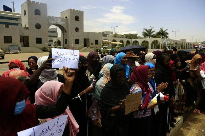 Sudanese women protest at the gates to army headquarters in Khartoum as protest leaders toughen their stance towards the military council which took the reins after top commanders toppled veteran president Omar al-Bashir last week