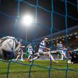 Hornets' sting: Watford's Etienne Capoue (3R) scores the goal that secured a 1-0 win away to QPR in the fifth round of the FA Cup on Friday