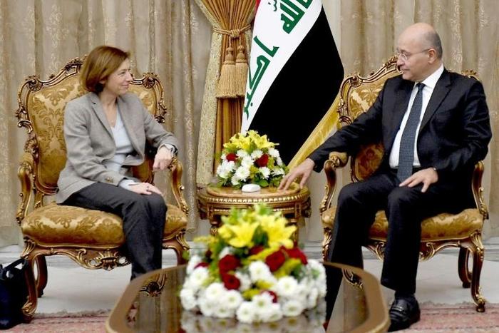 French Defence Minister Florence Parly (L) meets Iraqi President Barham Saleh (R) in Baghdad on February 8, 2019