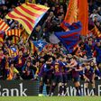 Barcelona players celebrate their fourth goal during the Spanish league match between FC Barcelona and Real Madrid CF at the Camp Nou stadium in Barcelona on October 28, 2018