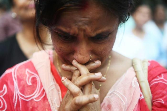 While staff have so far returned 115 victims to their relatives, there are still some 50 bags filled with unidentified remains in the morgue's refrigerated rooms