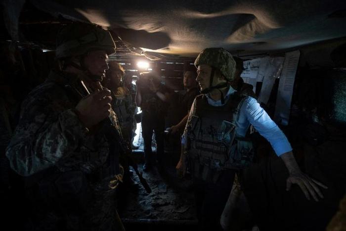 Ukrainian President Volodymyr Zelensky visits the front line of fighting against Russian-backed rebels