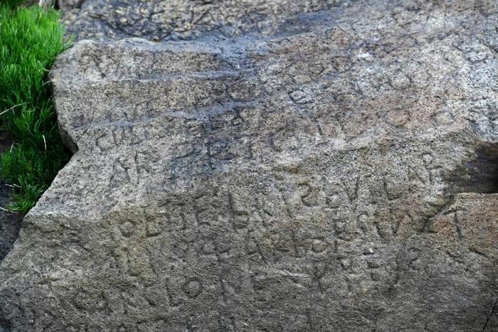 Could the inscription on this small boulder have been a love letter whose secret has remained untouched for centuries, or a proud note left by an eighteenth-century fort-builder? Or something even more mysterious?