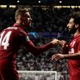Jordan Henderson and Mohamed Salah celebrate as Liverpool win the Champions League, beating Tottenham Hotspur 2-0 in the final