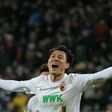 South Korean forward Ji Dong-won showed superb finishing with two goals to stun Bundesliga leaders Borussia Dortmund on Friday as struggling Augsburg sealed a shock 2-1 victory to ease their relegation woes