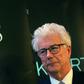 Ken Follett alongside an advertisement for his "The Pillars of the Earth" bestseller -- one of whose scenes is set in a Parisian cathedral that readers may very well assume is Notre-Dame
