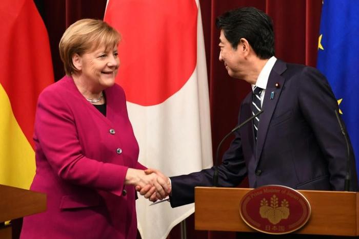 German Chancellor Angela Merkel held talks with Japanese Prime Minister Shinzo Abe during her visit to Tokyo