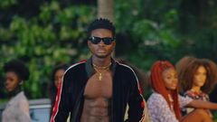 Kuami Eugene on set with girls