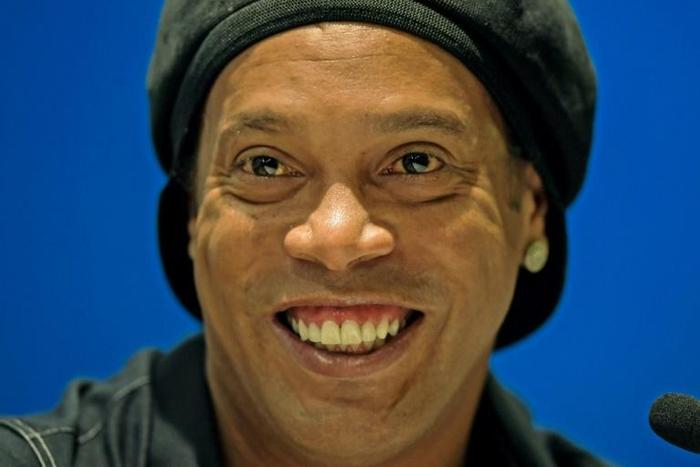 Former FC Barcelona and Brazil national Ronaldinho -- a supporter of right-wing President Jair Bolsonaro -- decries corruption in a rap duet video released on YouTube