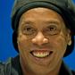 Former FC Barcelona and Brazil national Ronaldinho -- a supporter of right-wing President Jair Bolsonaro -- decries corruption in a rap duet video released on YouTube