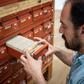 A historian works at the General Archive of the Nation, in Mexico City, on March 13, 2019, after the recent declassification of the archives of the Mexican intelligence service