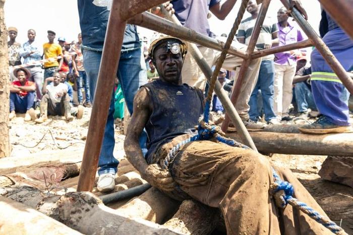 Rescue workers are still trying to save more miners trapped by flooding at the mine in Kadoma, Zimbabwe