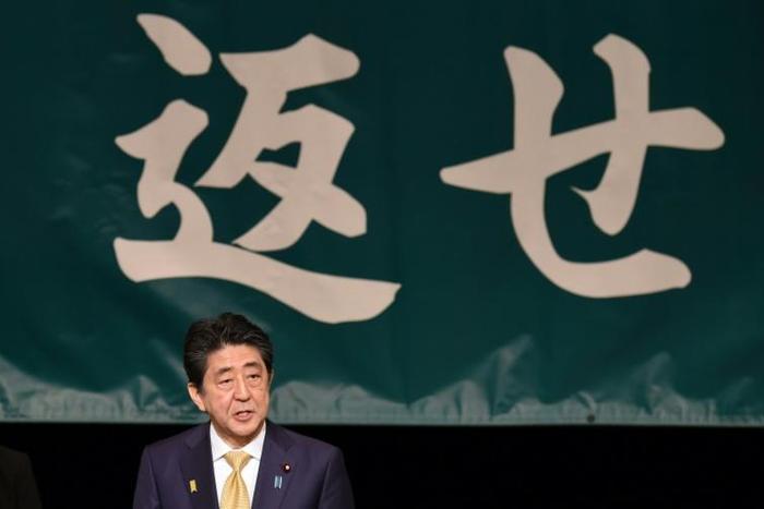Japan's Prime Minister Shinzo Abe struck a more conciliatory tone